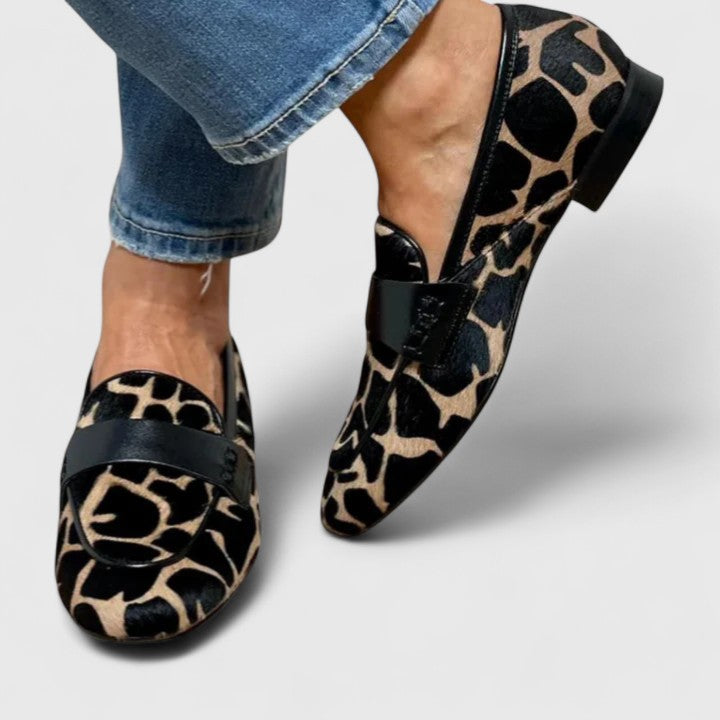 Polished black loafers for women