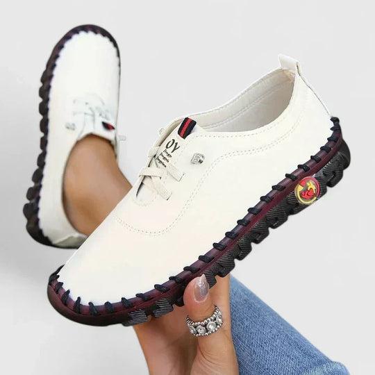 Elegant shoes in beige, black, brown and red for women
